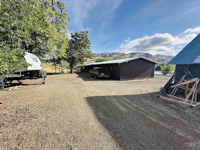 245 W 3rd St, Huntington, OR 97907 - view of yard featuring a mountain view