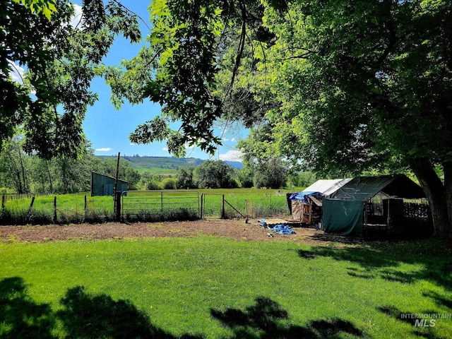 102 N Hornet Creek Rd, Council, ID 83612 - view of yard featuring an outdoor structure, exterior structure, and a view of countryside