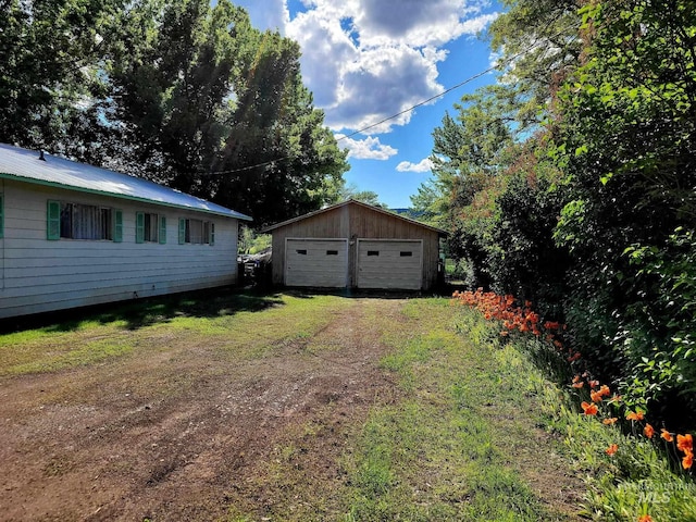 102 N Hornet Creek Rd, Council, ID 83612 - view of yard with a detached garage and an outbuilding