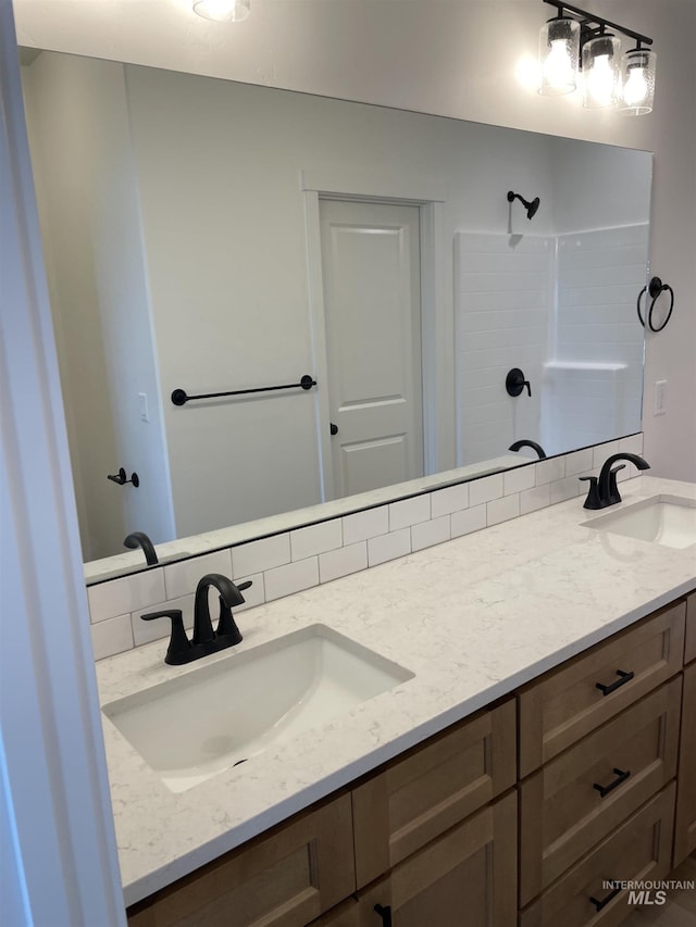 1207 Frank Henry Rd, Twin Falls, ID 83301 - full bathroom with double vanity and a shower