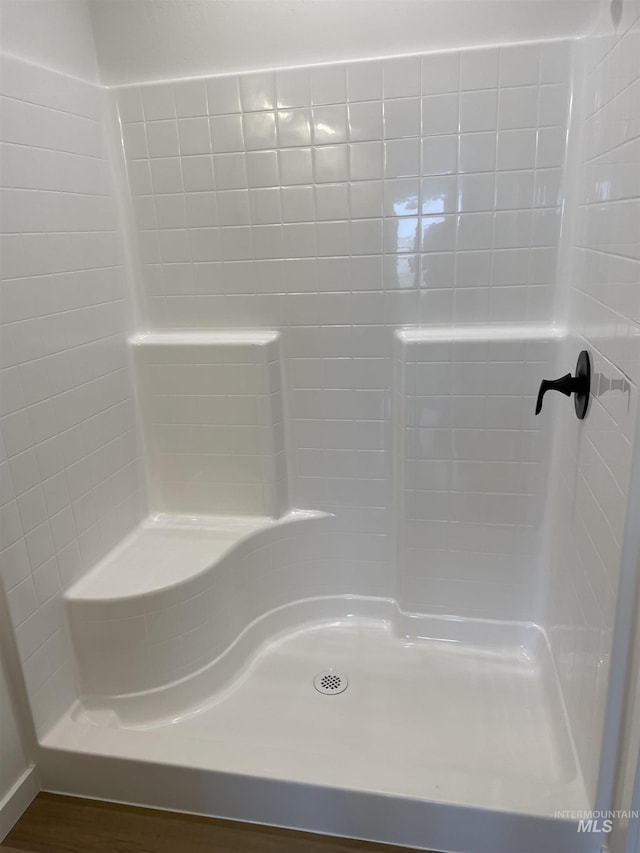 1207 Frank Henry Rd, Twin Falls, ID 83301 - full bath with a shower and wood finished floors