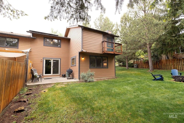 1955 E Parkside Dr, Boise, ID 83712 - rear view of house featuring a balcony, a patio area, and a chimney