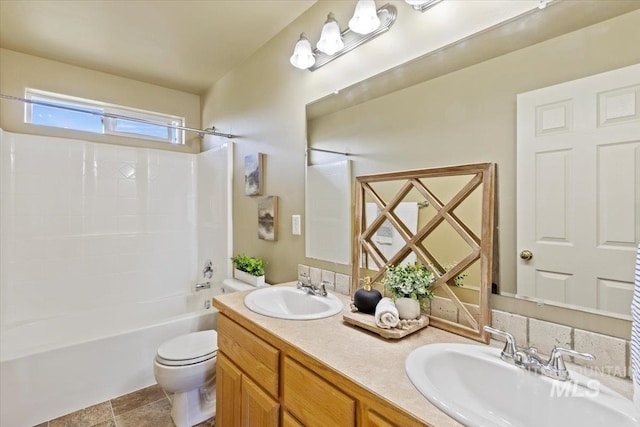 bathroom with toilet, shower / washtub combination, and double vanity