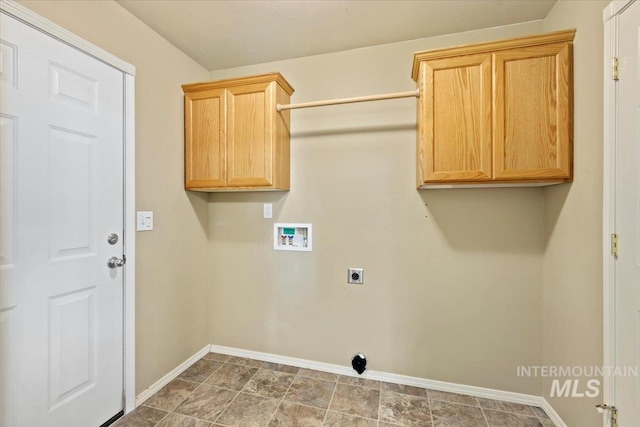 laundry area with washer hookup, baseboards, electric dryer hookup, and cabinet space