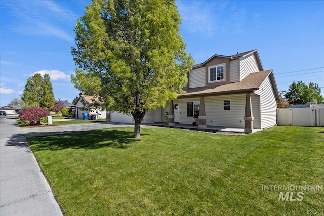 view of front of home featuring driveway and a garage