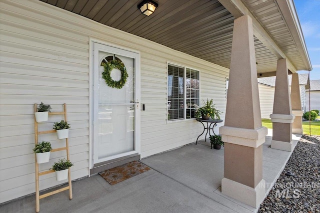 property entrance with a porch