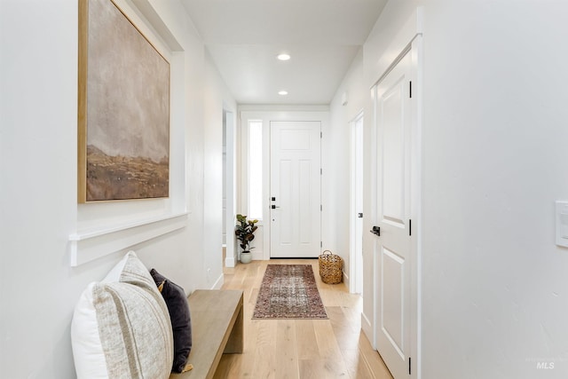 doorway to outside featuring recessed lighting and light wood-style flooring