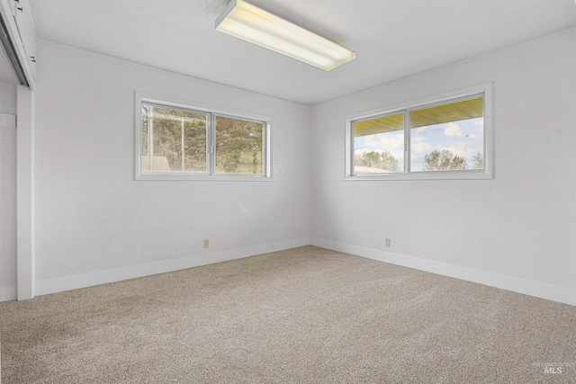 1006 S B St, Rupert, ID 83350 - spare room featuring carpet and baseboards