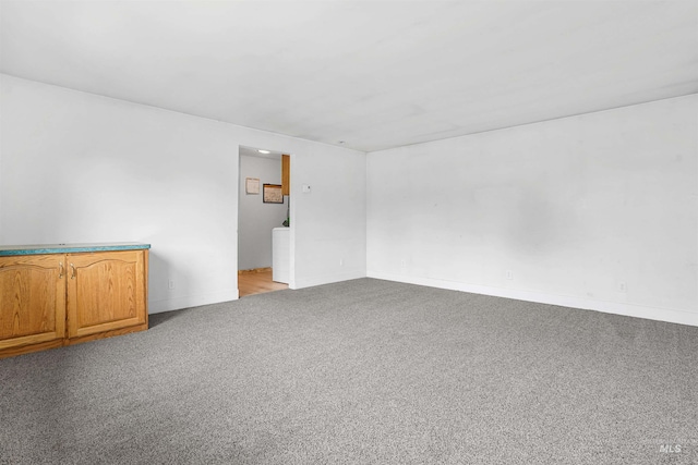 1006 S B St, Rupert, ID 83350 - carpeted spare room featuring baseboards