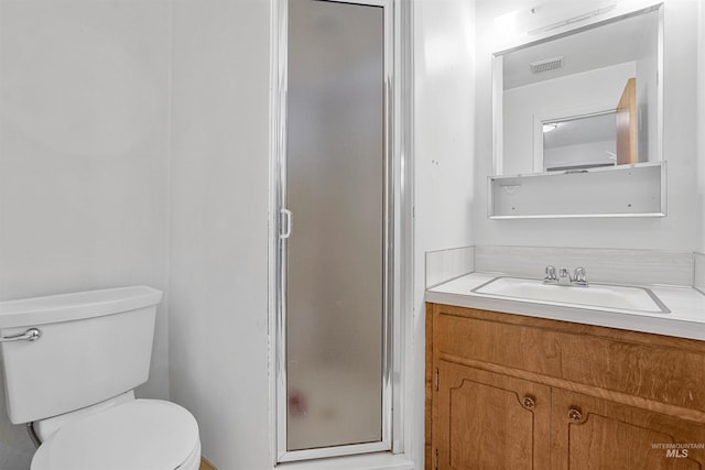 1006 S B St, Rupert, ID 83350 - full bath featuring a stall shower, vanity, and toilet
