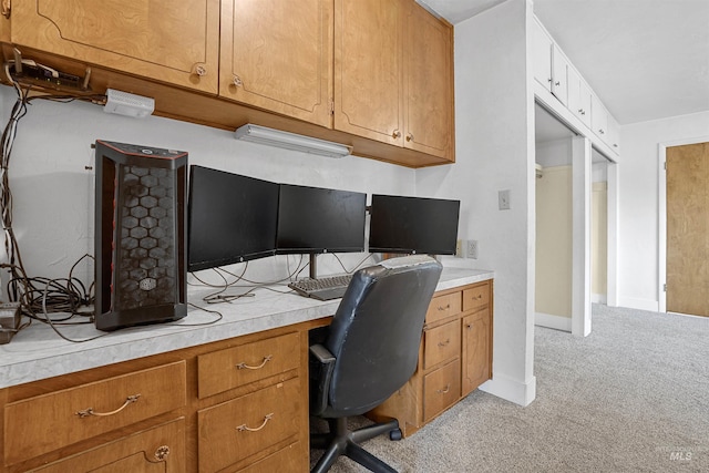 1006 S B St, Rupert, ID 83350 - home office with light colored carpet, built in desk, and baseboards