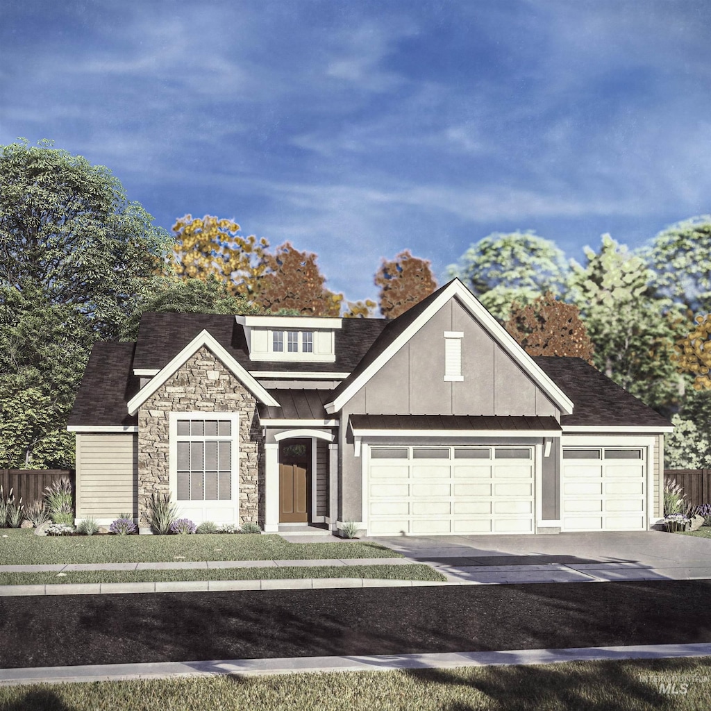 view of front of home with roof with shingles, fence, stone siding, and an attached garage