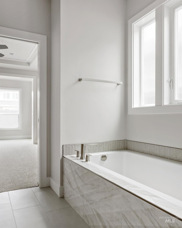 4364 N Madden Way, Meridian, ID 83646 - full bathroom with baseboards, tile patterned flooring, and a garden tub