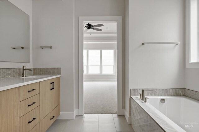 4364 N Madden Way, Meridian, ID 83646 - bathroom featuring a bath, ceiling fan, tile patterned flooring, and vanity