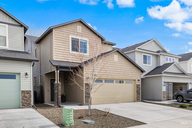 craftsman-style home featuring concrete driveway, a garage, and roof with shingles