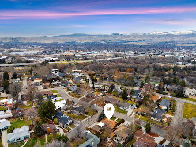 aerial view at dusk with a mountain view