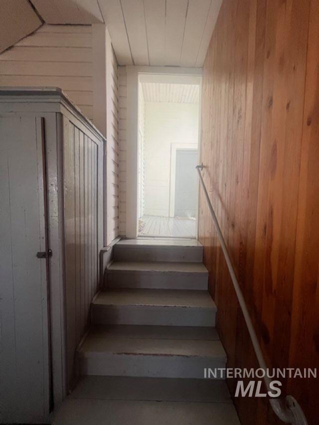 2070 Woodland Rd, Kamiah, ID 83536 - staircase with wood walls