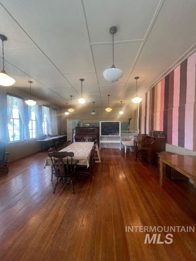 2070 Woodland Rd, Kamiah, ID 83536 - dining room with wallpapered walls and hardwood / wood-style floors