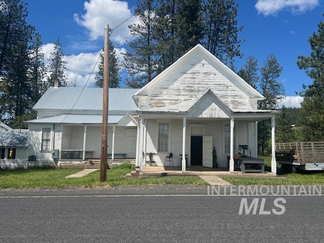2070 Woodland Rd, Kamiah, ID 83536 - view of front of property with a porch and metal roof