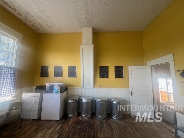 2070 Woodland Rd, Kamiah, ID 83536 - laundry area featuring washer and dryer, a wainscoted wall, wood finished floors, plenty of natural light, and wooden ceiling