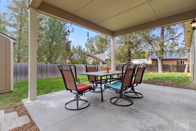 view of patio / terrace featuring outdoor dining space and a fenced backyard