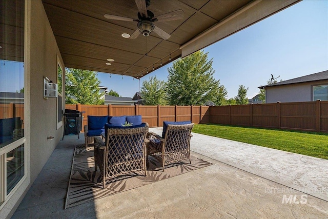 view of patio featuring ceiling fan