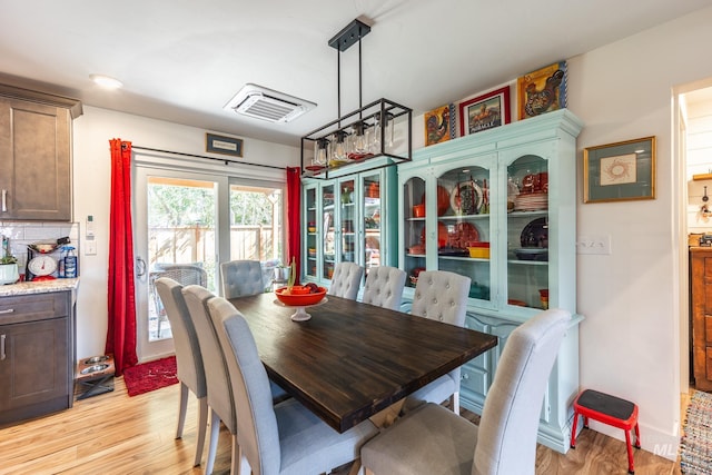 dining room featuring light hardwood / wood-style floors