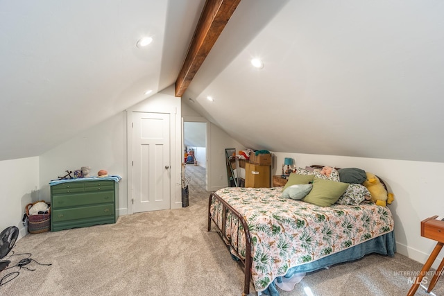 carpeted bedroom featuring lofted ceiling with beams