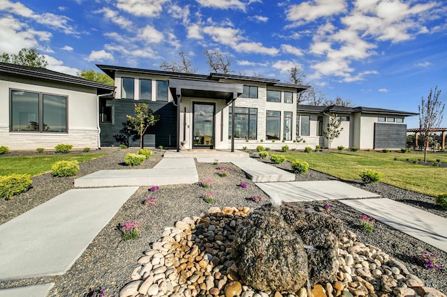 view of front of home with a front yard