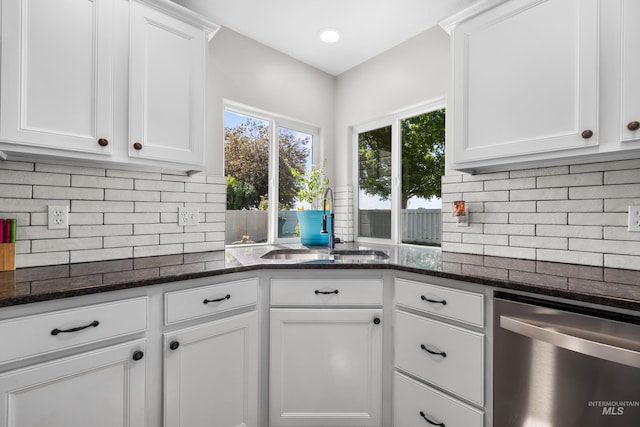 2145 W Quilceda, Kuna, ID 83634 - kitchen with dishwasher, a sink, white cabinets, dark stone counters, and backsplash