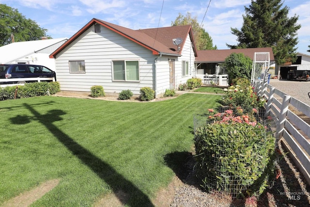 view of front of home with a front yard