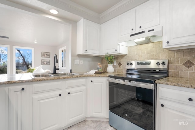 kitchen with sink, white cabinetry, backsplash, and stainless steel electric range oven