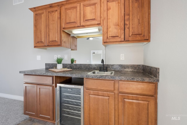 kitchen with sink and beverage cooler