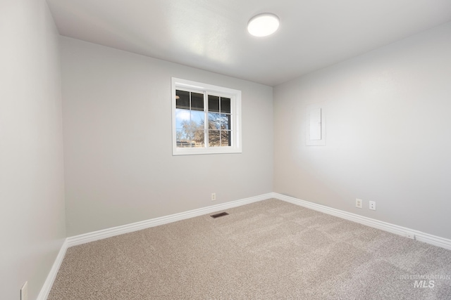 spare room with carpet flooring