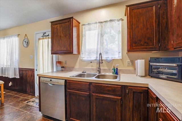 206 Diamond Dr, Kimberly, ID 83341 - kitchen with dishwasher, a sink, plenty of natural light, light countertops, and a wainscoted wall