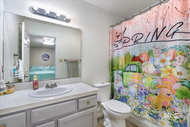 206 Diamond Dr, Kimberly, ID 83341 - full bath featuring vanity, toilet, connected bathroom, and curtained shower