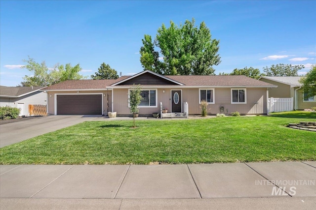 206 Diamond Dr, Kimberly, ID 83341 - ranch-style home with a garage and concrete driveway
