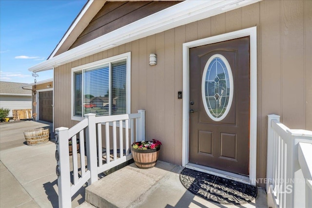 206 Diamond Dr, Kimberly, ID 83341 - entrance to property featuring driveway, covered porch, and an attached garage