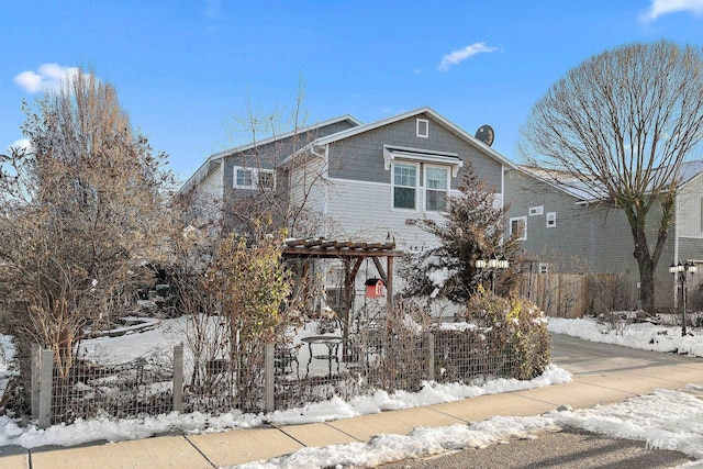 front of property with a pergola