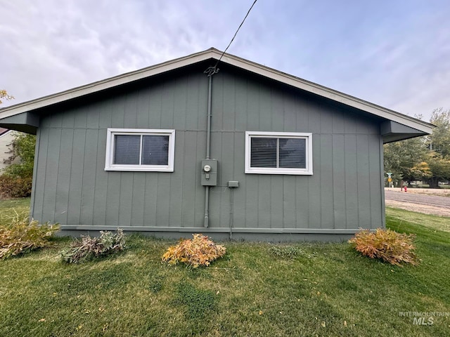 view of home's exterior featuring a lawn