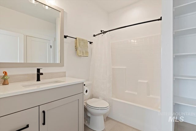 full bathroom with toilet, shower / tub combo with curtain, and vanity