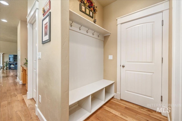 mudroom with light wood-type flooring