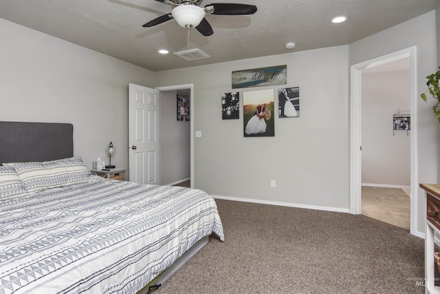 carpeted bedroom featuring ceiling fan