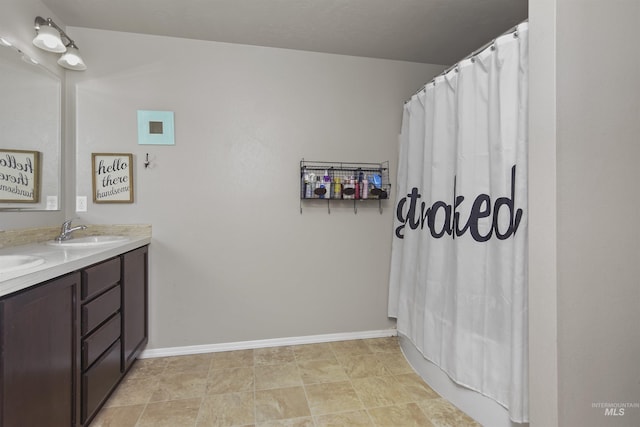 bathroom with vanity and shower / bath combo