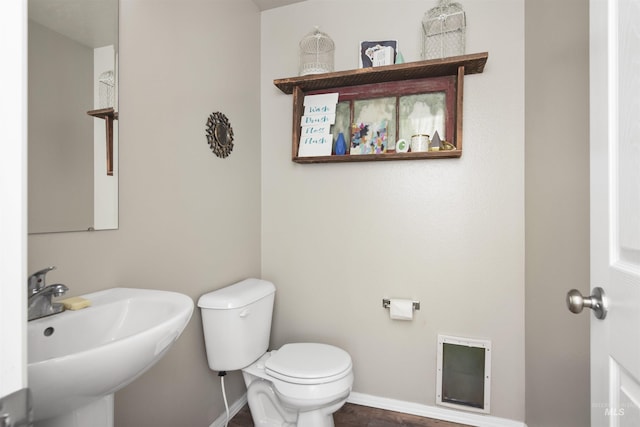 bathroom with sink and toilet