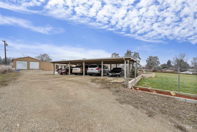 view of parking / parking lot with a carport and a yard