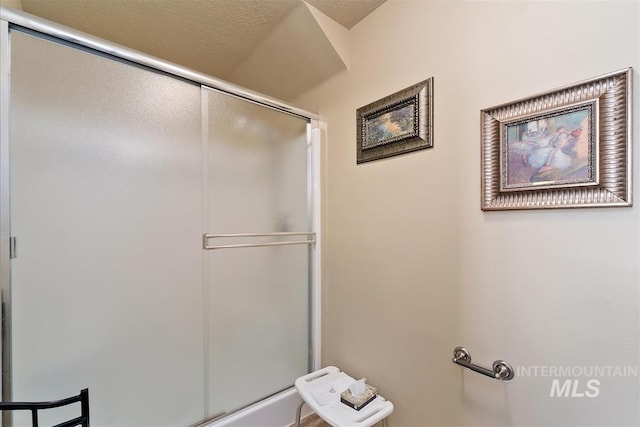 bathroom featuring a stall shower