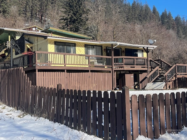 view of front of house with a wooden deck