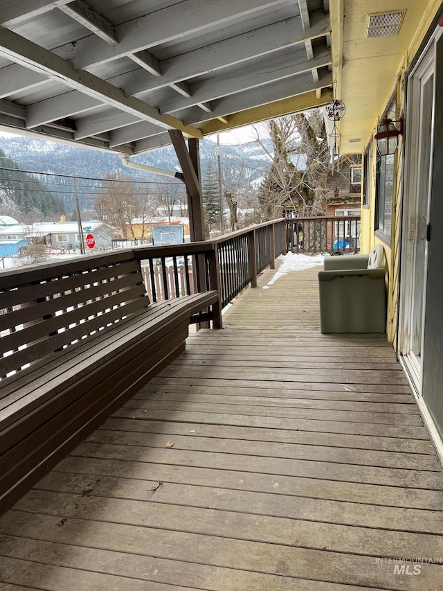 view of snow covered deck