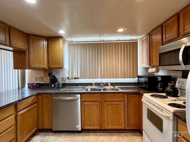 kitchen featuring appliances with stainless steel finishes and sink